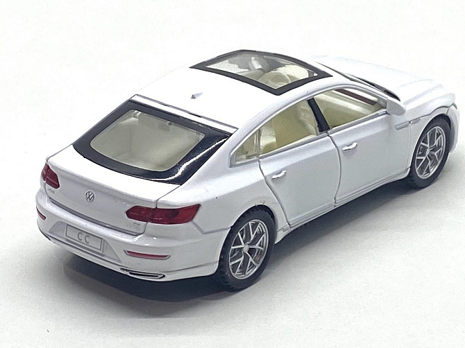 Машинка металева Volkswagen Passat SS 1:32 світло звук Біла (GT-01200) Чернігів - фото 3