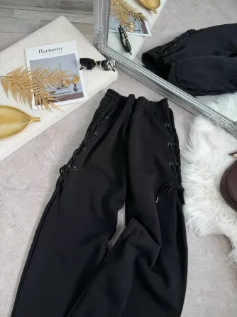 Теплые женские спортивные штаны оверсайз на флисе со шнуровкой по бокам снизу на затяжках Харьков