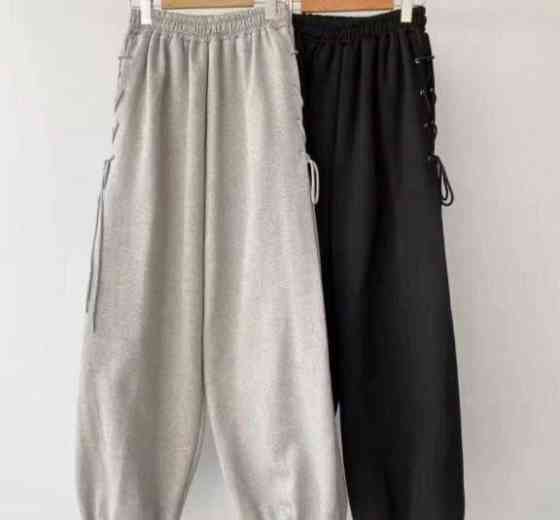 Женские очень широкие оверсайз брюки с акцентной шнуровкой по бокам Черный Одесса