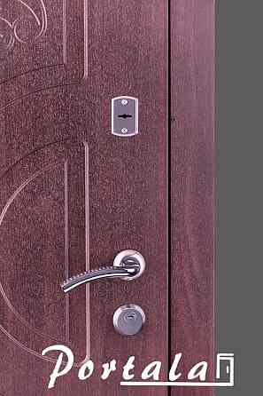 Двери уличные, серия Элегант, модель Рассвет, гнутый профиль, 2 контура уплотнения, 2 замка Киев