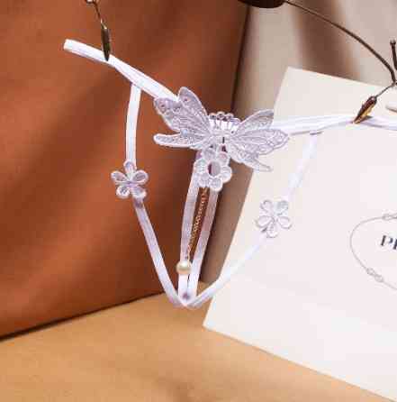 Трусики з розрізом та бусинками, квіточками, метеликами білі - розмір універсальний (на резинці), 15% нейлон, 85% поліестер Київ