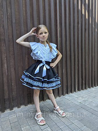 Гарна шкільна спідничка з білим мереживом Кривий Ріг - фото 6