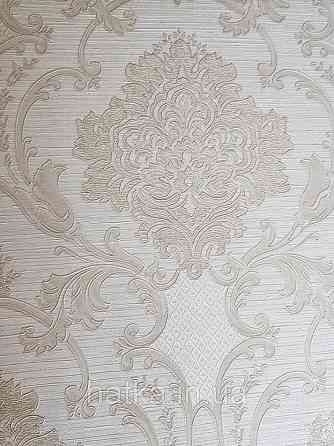 Шпалери вінілові на флізелін Grandeco Montana A45004 метрові вензелі структурні золотом на молочному під Київ