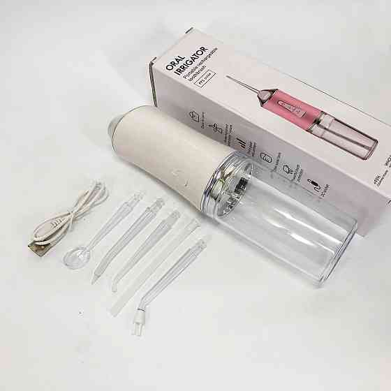 Ирригатор для чистки зубов и полости рта Oral Irrigator с аккумулятором и сменными насадками. Цвет: белый KA-31 Львов