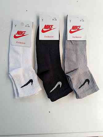 Детские качественные хлопковые средней висоты носки в наборе по 3шт разного цвета Nike. Размер 31-34 Киев