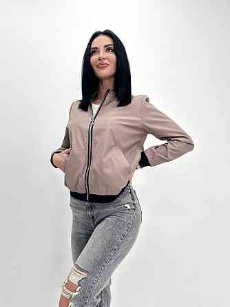 Жіноча вітровка з щільної плащівки "Leland" оптом | Розпродаж моделі Київ