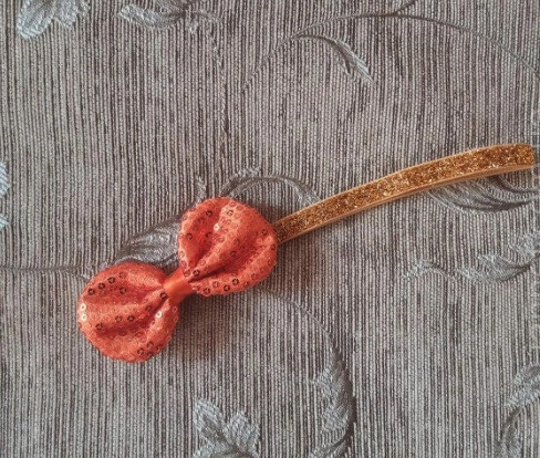 Дитяча помаранчева пов'язка з паєтками - бант 9*5 см, окружність 38-50см Київ - фото 1