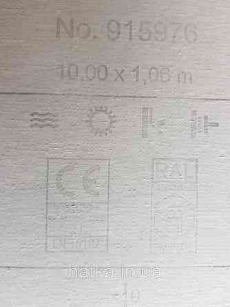 Шпалери вінілові на флізелін Rasch Riva 1.06х10 однотонні структурні під тканину сірі з зеленим 915976 Київ