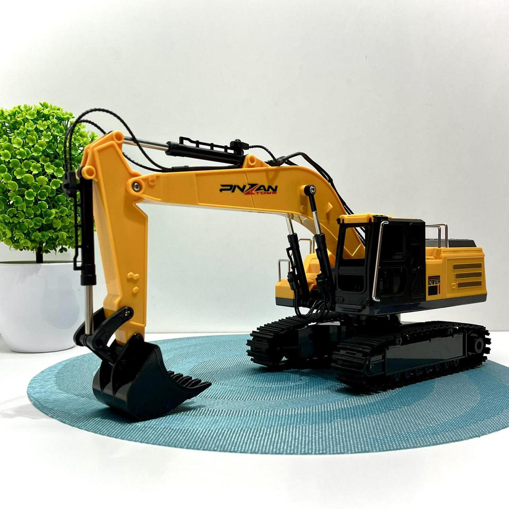 Екскаватор на радіокеруванні на акумуляторі холодний пар-дим рухомий ківш USB зарядне світло Жовто-чорний (9035E) Чернігів - фото 1