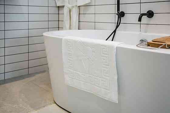 Ecotton Килимок махровий Ecotton 50х70 см 650 гр./м рушник для ніг білий з тисненням Ніжки для Киев