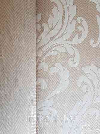 Текстильні шпалери на флізеліновій основі Cador Rasch Textil 086644 теракотова основа зигзаги вензелі бежевий Київ