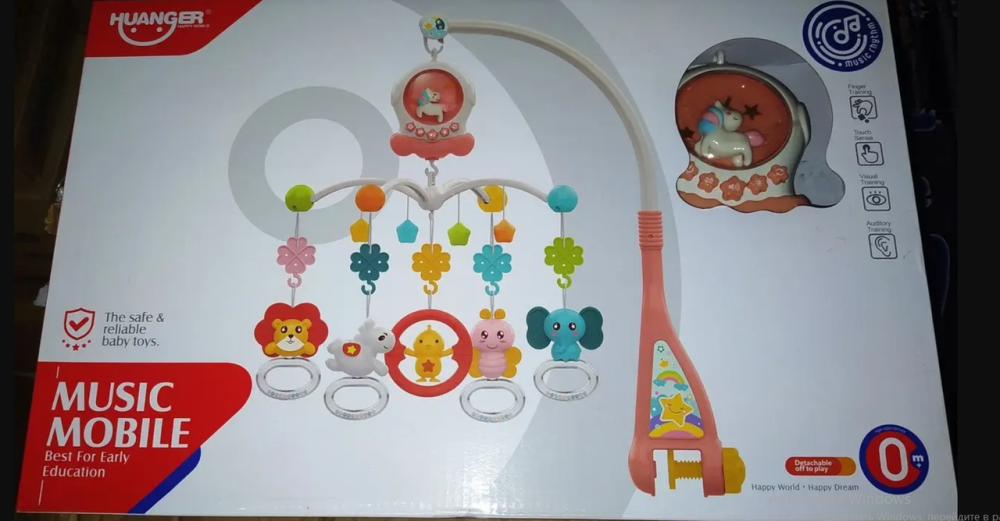Карусель мобіль Huanger 100 мелодій, 5 брязкальце, підсвічування, на батарейках, в коробці (HE 0311/0312) Чернігів - фото 1