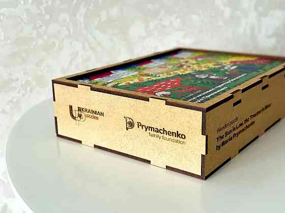 Пазл дерев'яний UkrainianPuzzles Сонце низько, трактор близько Марія Примаченко ( 11921 ) Харьков