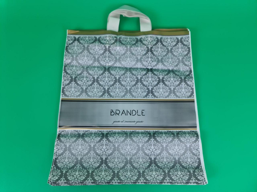 Пакет із петльовою ручкою середній щільний ламінований "Брендл 397" (40х45+3) 95 мк КВС (50 шт) Харків - фото 1