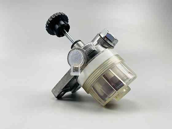 Фільтр очищення палива з прокачуванням (універсальний), кріплення горизонтальне. Усередині змінний елемент (сітка) Мукачево