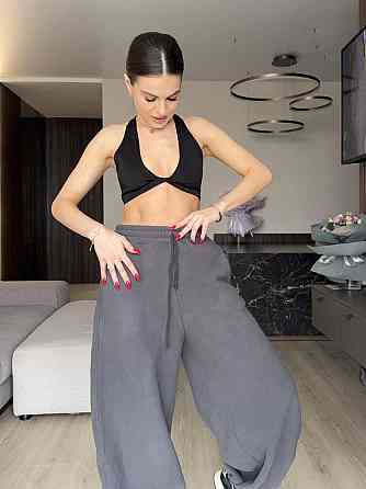 Женские теплые объемные брюки 