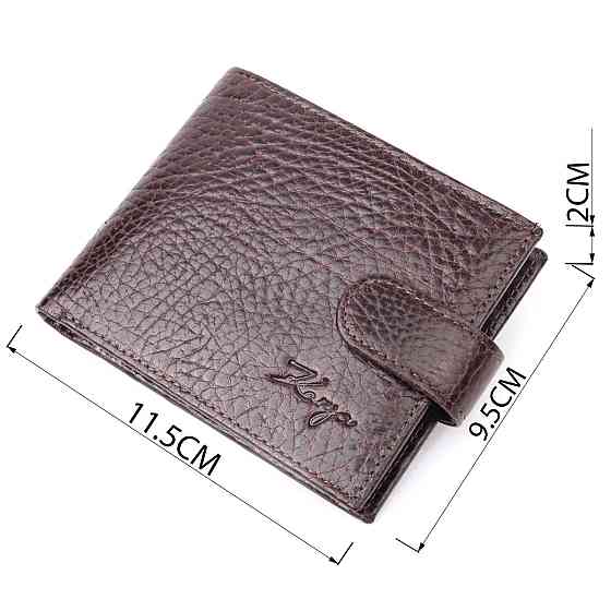 Місткий чоловічий гаманець з хлястиком із натуральної шкіри KARYA 21078 Коричневий Київ