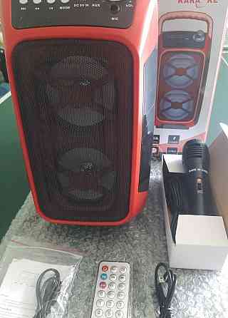 Колонка нова з мікрофоном та пультом. Киев