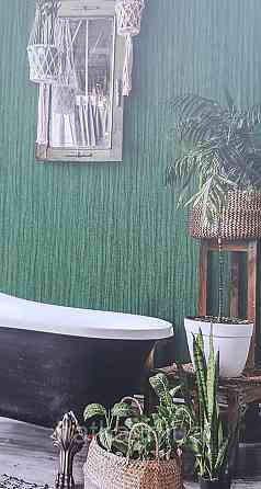 Шпалери вінілові на флізеліні AdaWall Seyyah 1.06х10 однотонні хвилясті смуги структурні смарагдові зелені Київ