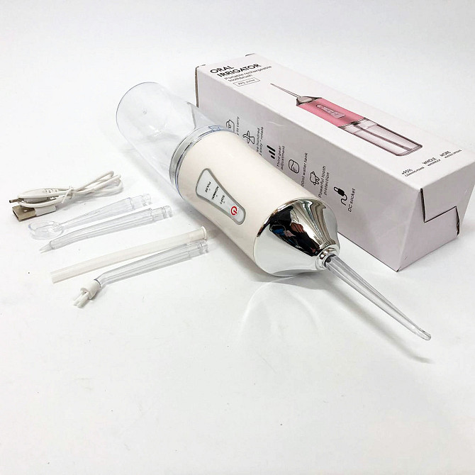 Іригатор для чищення зубів та порожнини рота Oral Irrigator з акумулятором та змінними насадками. BC-907 Колір: білий Київ - фото 2