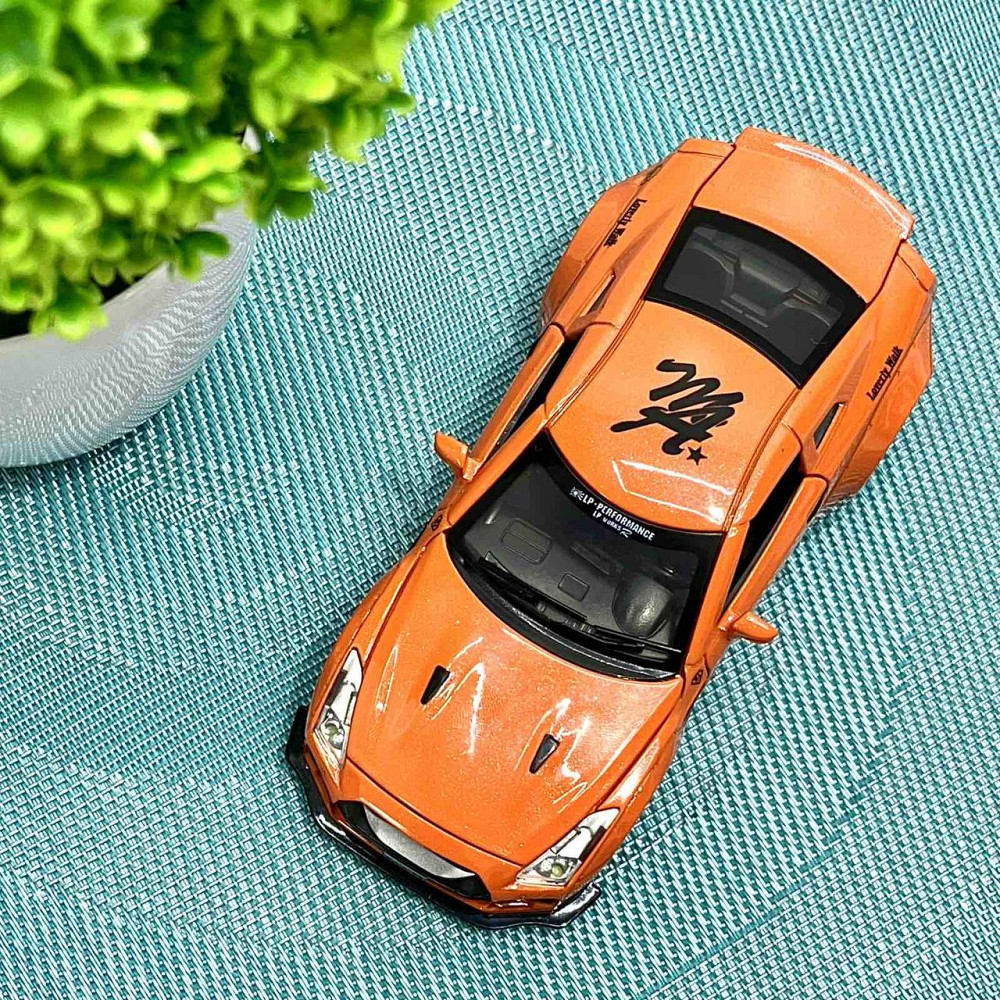Машинка Auto Expert Nissan GTR металева 1:32 світло/звук/інерційна Жовтогаряча (38071) Чернигов - изображение 3