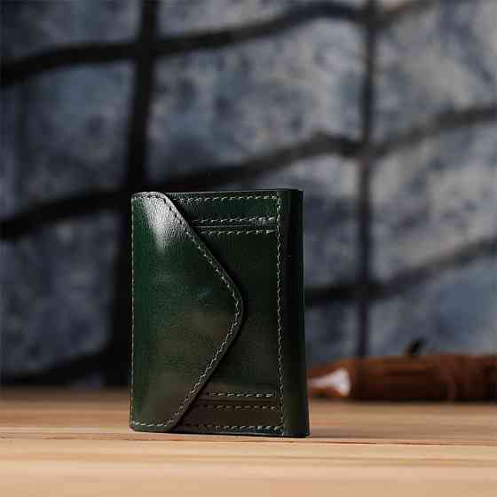 Відмінний гаманець у три складання з натуральної гладкої шкіри GRANDE PELLE 22944 Зелений Київ