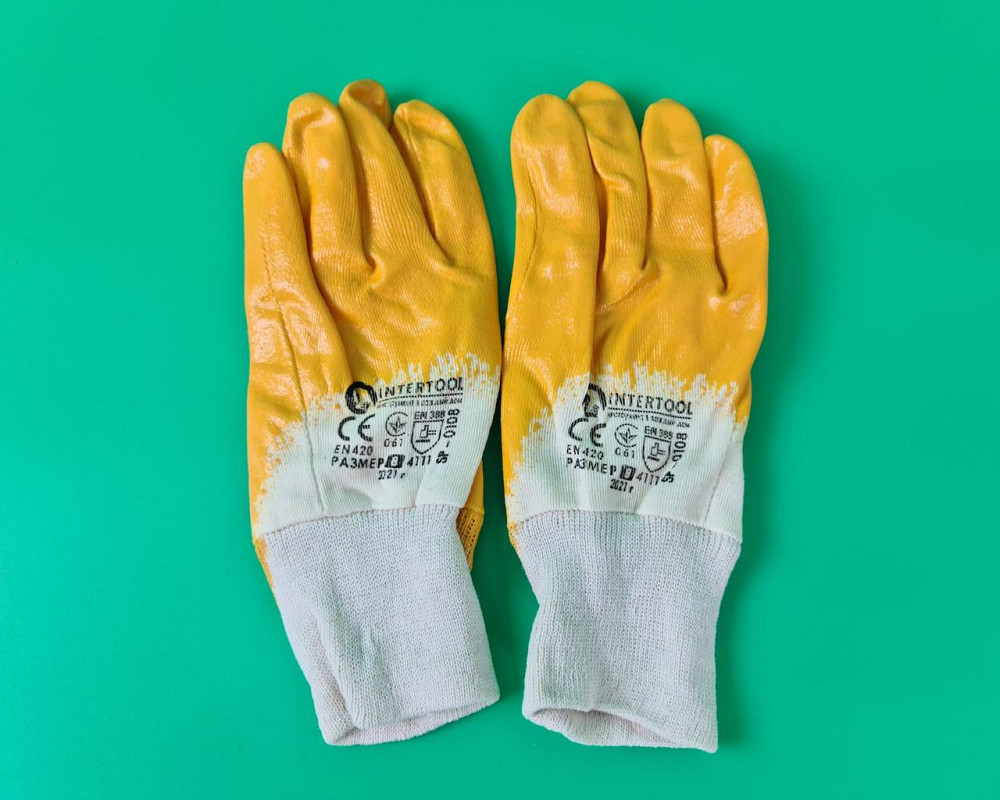 Господарські рукавички Залита Нітрил жовтий No8 "Intertool" (12 пар) Харків - фото 1