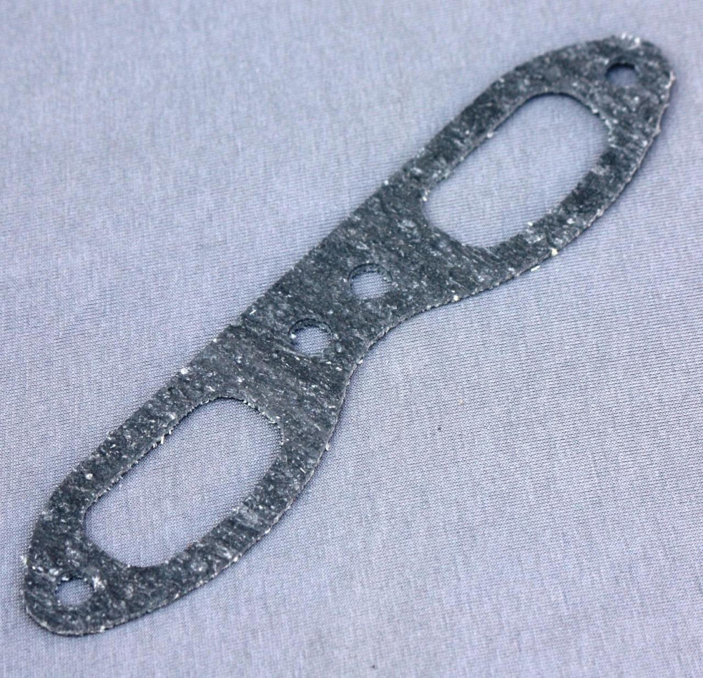 Прокладка впускного колектора мотоцикл Іж Юпітер (під штани) (окуляри) (10шт) Мукачево - фото 1