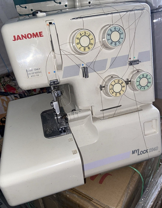 Надежный  металлический 4 ниточный оверлок с самой простой запракой. Харьков - изображение 1