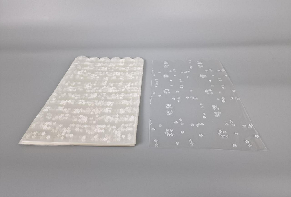 Пакет із малюнком для пакування подарунків (20*35) No383 (3) (ажурний) "Ромашка" (100 шт.) Харків - фото 1