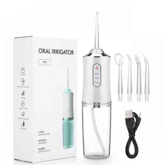 Іригатор ORAL IRRIGATOR з насадками, регулюванням тиску та зручністю для щоденної гігієни зубів Київ
