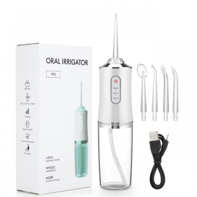 Иригатор ORAL IRRIGATOR с насадками, регулировкой давления и удобством для ежедневной гигиены зубов Киев - изображение 4