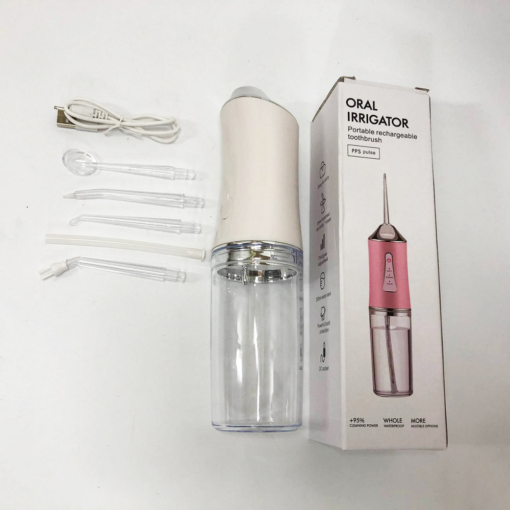 Ирригатор для чистки зубов и полости рта Oral Irrigator с аккумулятором и сменными насадками. Цвет: белый HK-42 Львов - изображение 9