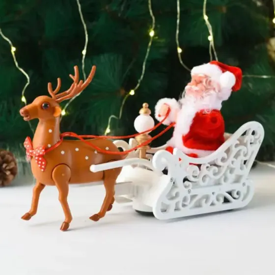 Музыкальная игрушка "Санта Клаус с оленем на санях" Коломыя