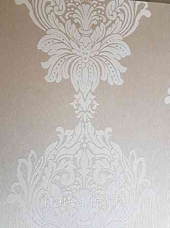 Текстильні шпалери на флізеліновій основі Cador Rasch Textil 086774 вензелі бежевий молочний Київ