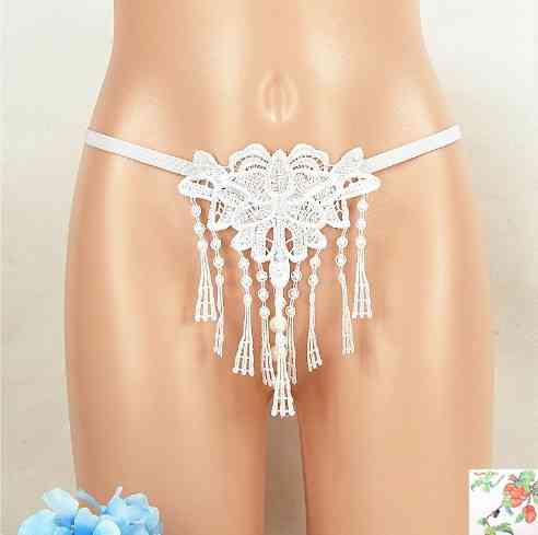 Еротичні стрінги з бусинками білі - розмір універсальний (на резинці), 15% нейлон, 85% поліестер Київ