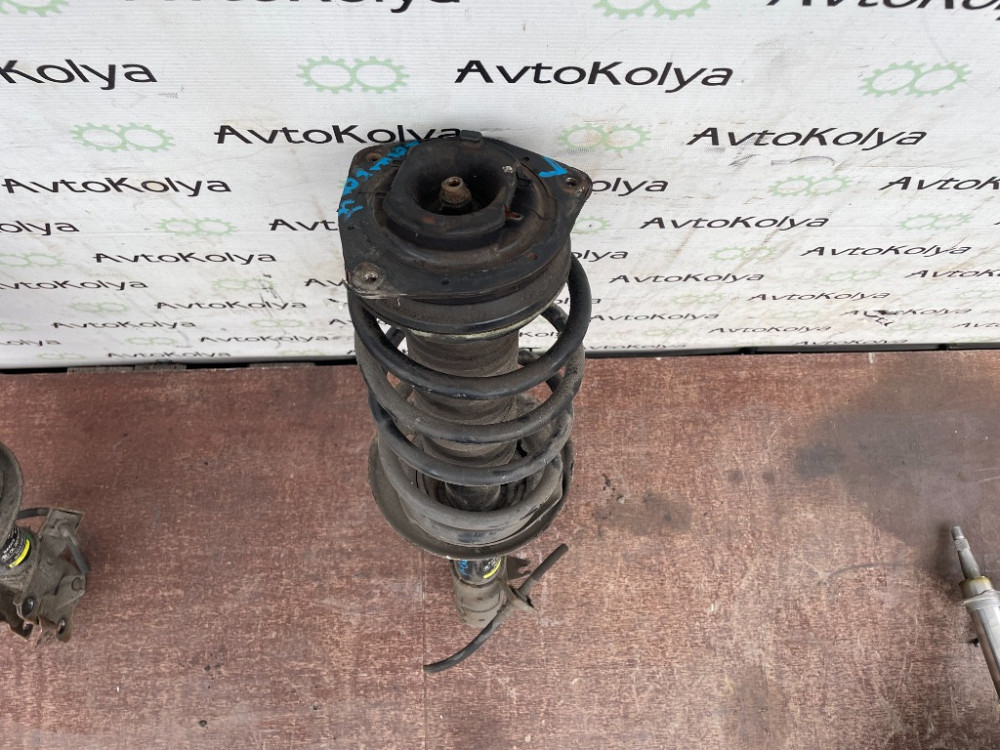 Амортизатор передній лівий (стійка) Nissan Qashqai 2007-2013 (54303BR00B) Ковель - фото 3