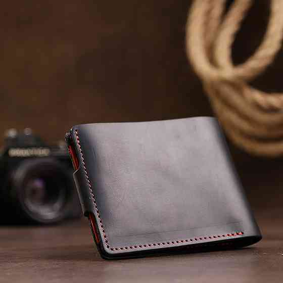 Кожаное матовое портмоне унисекс GRANDE PELLE 11542 Черный Киев