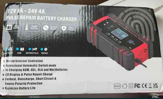 Автомобильное зарядное устройство.Імпульсний зарядний пристрій RJ Киев