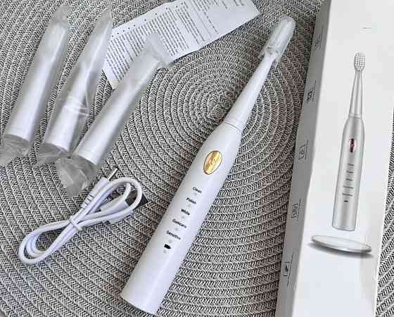 Электрическая зубная щетка. Киев