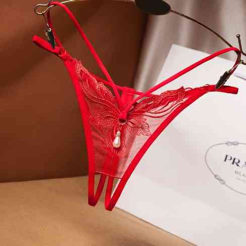 Еротичні трусики з розрізом та бусинкою червоні - розмір універсальний (на резинці), в талії до 85см Київ