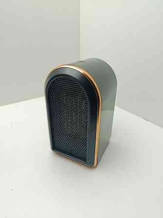 Портативний керамічний обігрівач PTC 1200W(товар вживаний) Луцк