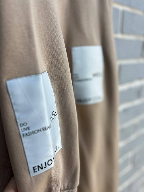 Костюм жіночий ENJOY 2920 худі з капюшоном брюки резинка нашивка утеплений фліс бежевий, бежевий, S Київ - фото 8