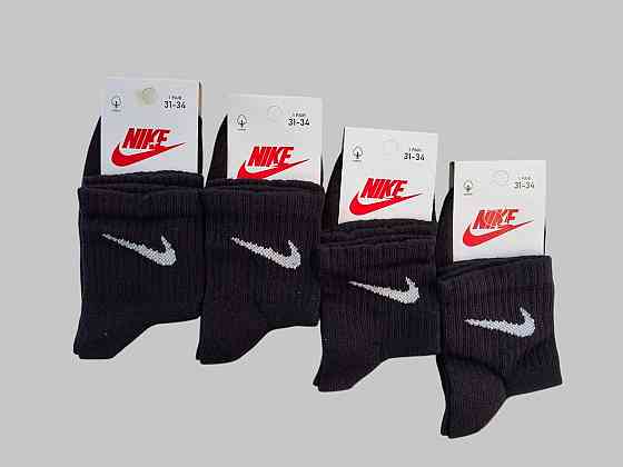 Дитячі якісні бавовняні шкарпетки Чорного кольору середньої висоти в наборі 4 штук Nike. Розмір 31-34 Київ