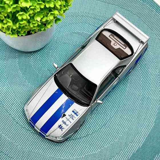 Машинка металева Авто Експерт Nissan GT-R 1:24 світло/звук відчиняються двері капот багажник Сіра (1990-21) Чернігів