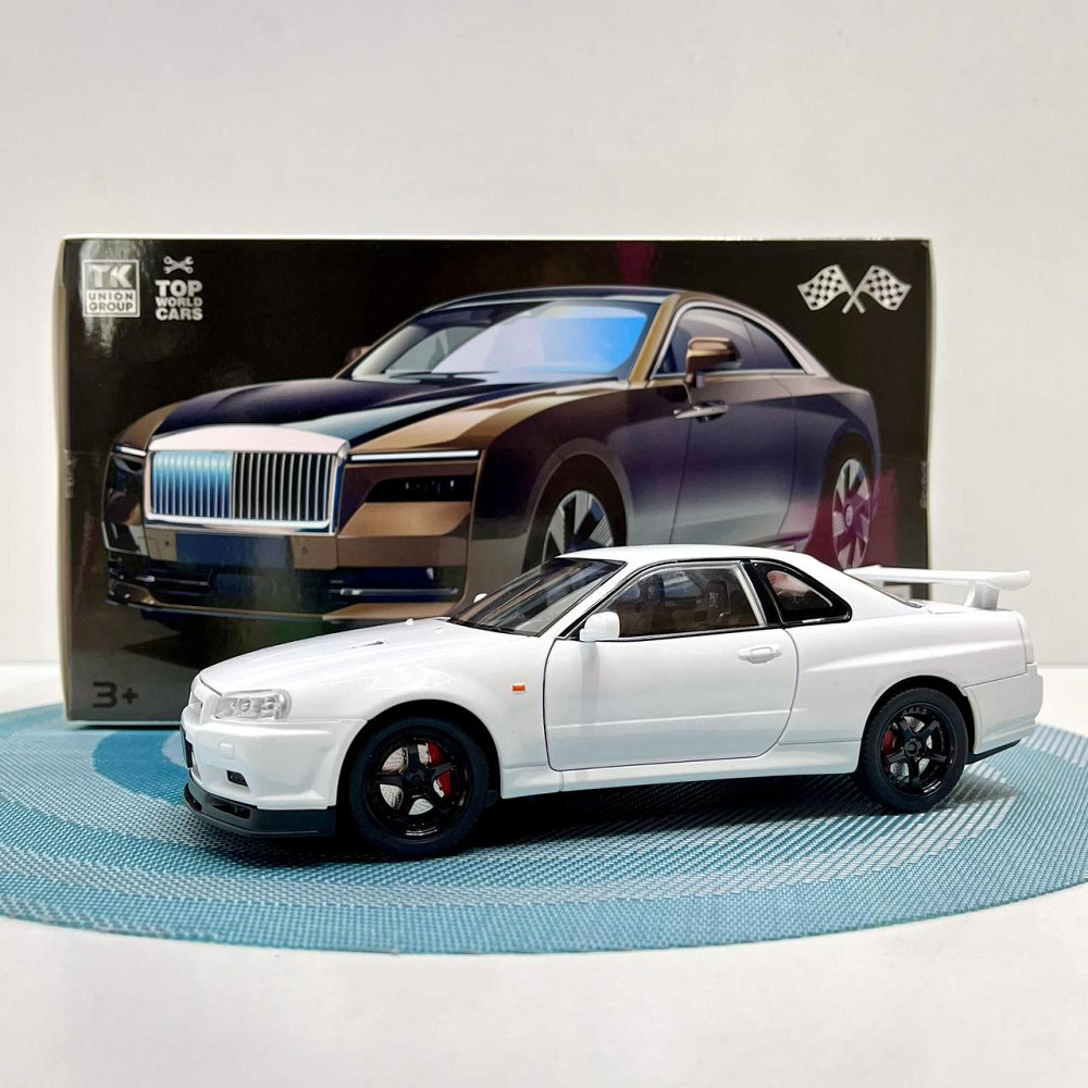 Машинка металева Авто Експерт Nissan GT-R 1:24 світло/звук відчиняються двері капот багажник Біла (1990-21) Чернигов - изображение 9