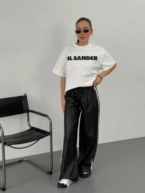 Жіночі теплі шкіряні штани з лампасами на флісі знизу з затяжками Харків - фото 1