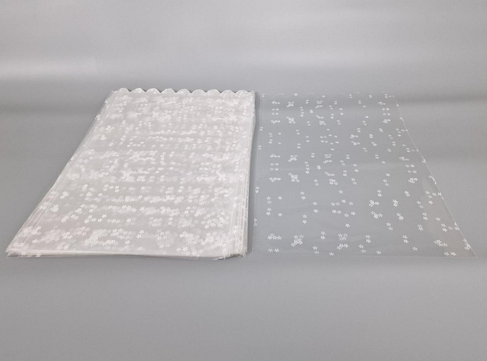 Пакет із малюнком для пакування подарунків (30*50) No393 (3) (ажурний) "Ромашка" (100 шт.) Харків - фото 1