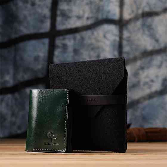 Відмінний гаманець у три складання з натуральної гладкої шкіри GRANDE PELLE 22944 Зелений Київ
