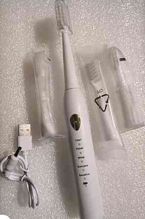 Зубна  ультразвукова  щітка Харків